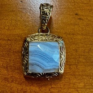 Elegant Gold and Blue Pendant